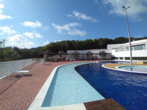 Condomínio encantador próximo a praia , 3 quartos.